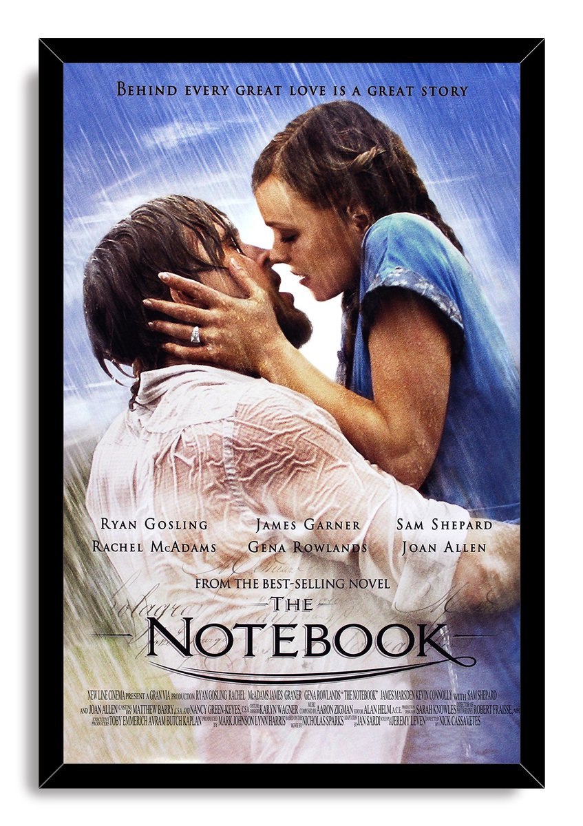 The Notebook framed wall art print featuring a rain-soaked couple embracing, set within a black mitered frame.
