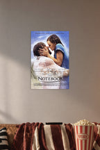 The Notebook Movie Poster Ryan Gosling Rachel McAdams Kiss in a cozy movie room above a brown sofa with popcorn.