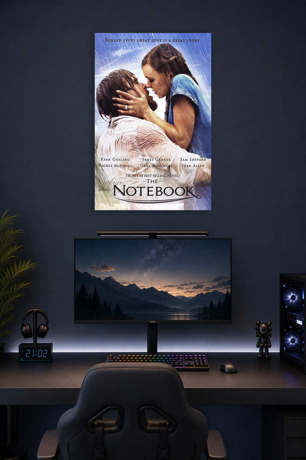 The Notebook Movies in a gaming desk setup above a monitor.