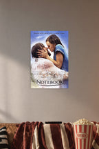 The Notebook Movies in a cozy movie room above a brown sofa with popcorn.