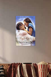 The Notebook Movies in a cozy movie room above a brown sofa with popcorn.