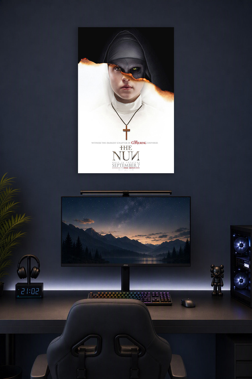The Nun Horror Movie in a gaming desk setup above a monitor.
