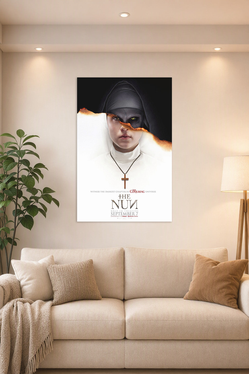 The Nun Horror Movie in a bright living room above a beige sofa.