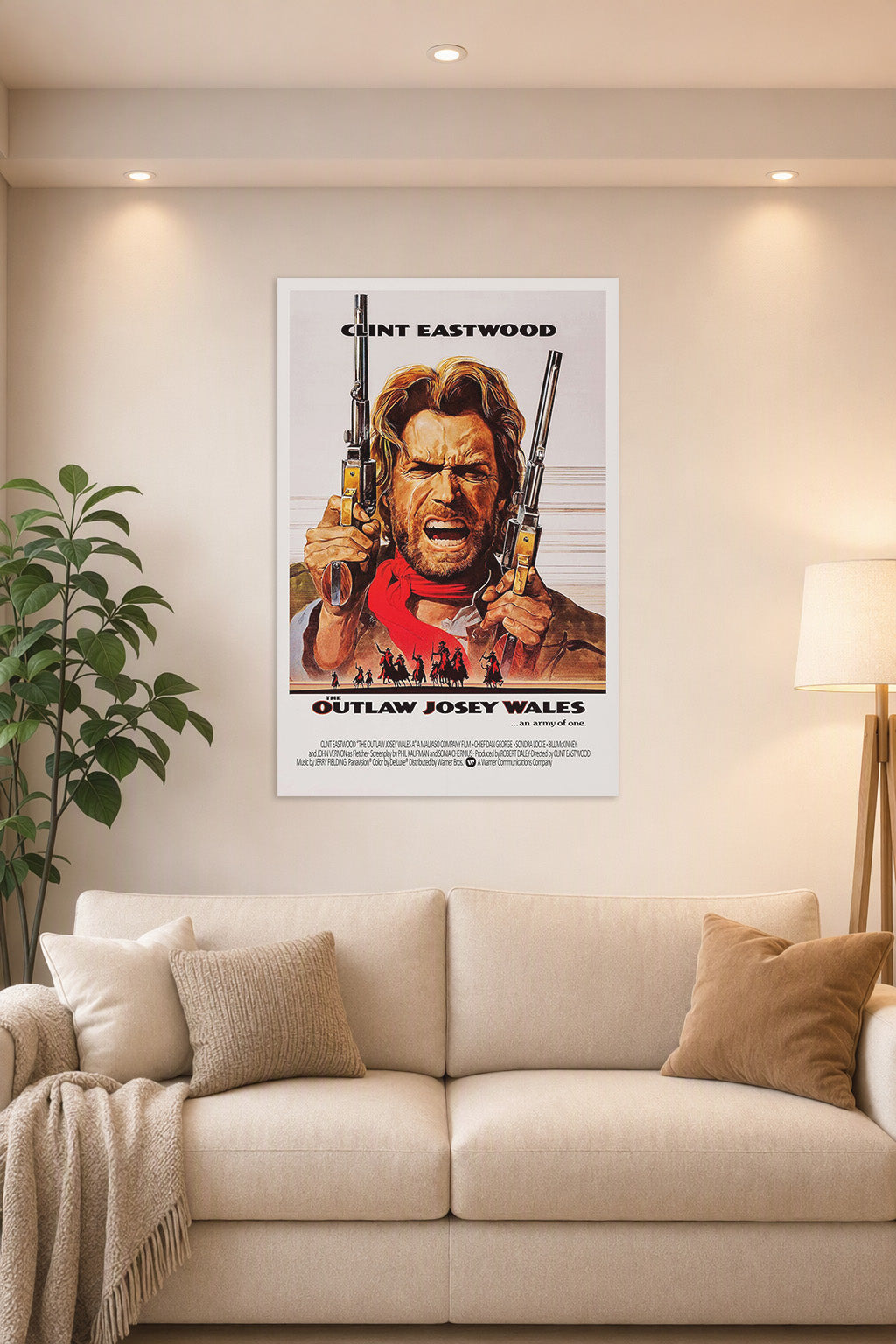 The Outlaw Josey Wales in a bright living room above a beige sofa.