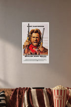 The Outlaw Josey Wales in a cozy movie room above a brown sofa with popcorn.