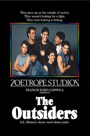 The Outsiders movie poster features seven young men in denim and leather inside a rainbow-bordered portrait on black.