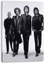 The Rolling Stones canvas wall art print displays four band members striding toward the camera in a monochrome studio portrait.