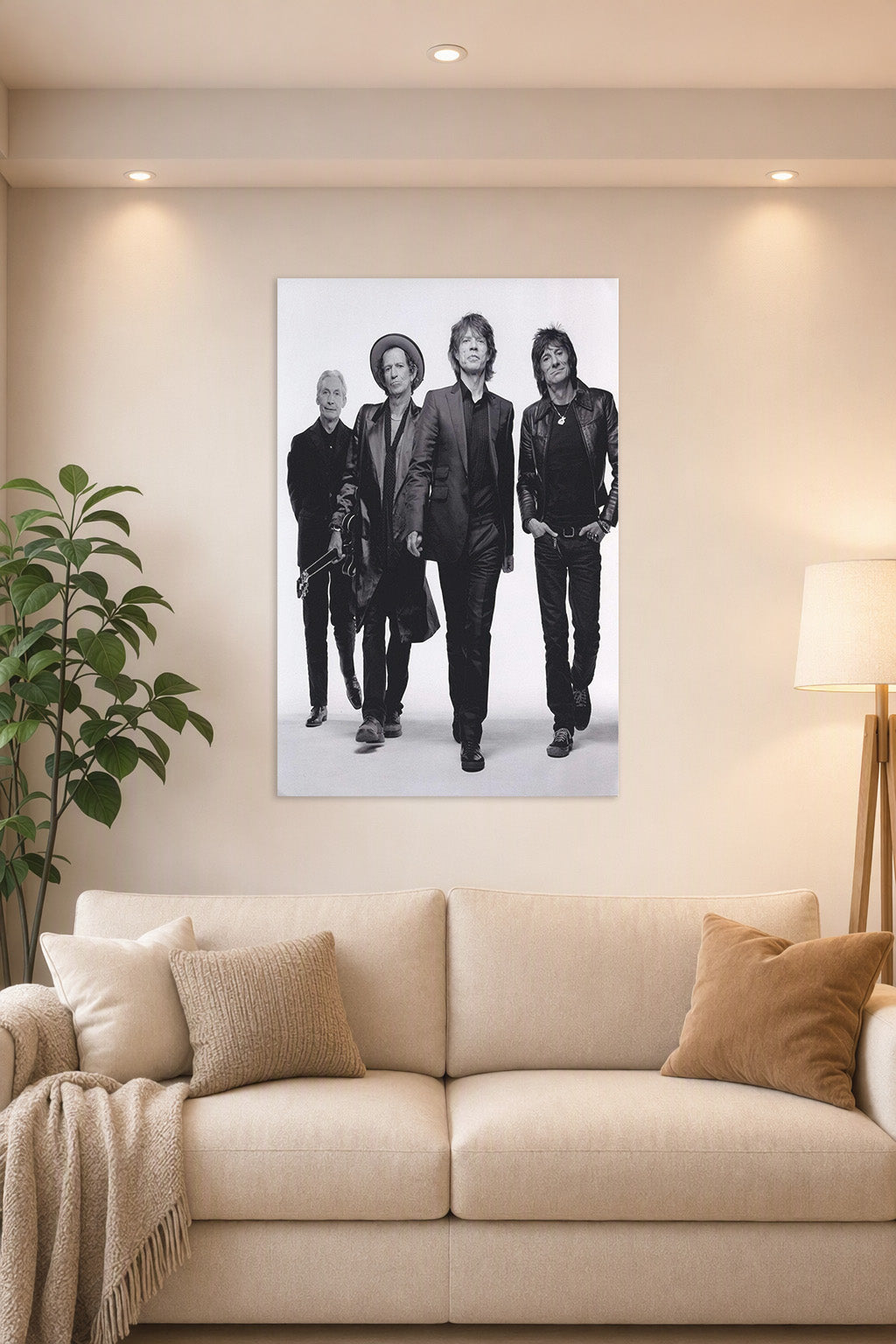 The Rolling Stones in a bright living room above a beige sofa.