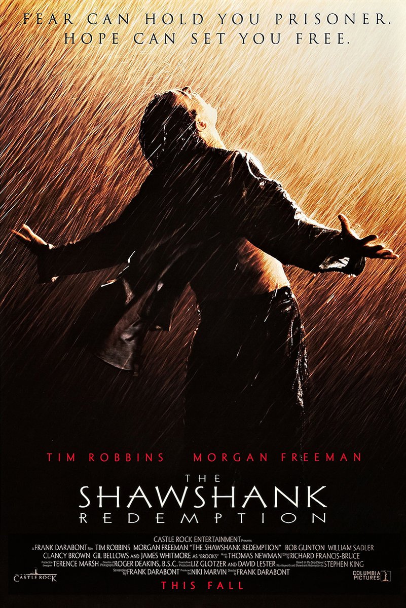 The Shawshank Redemption poster features Andy Dufresne standing in heavy golden rain with arms spread beneath the hope quote.