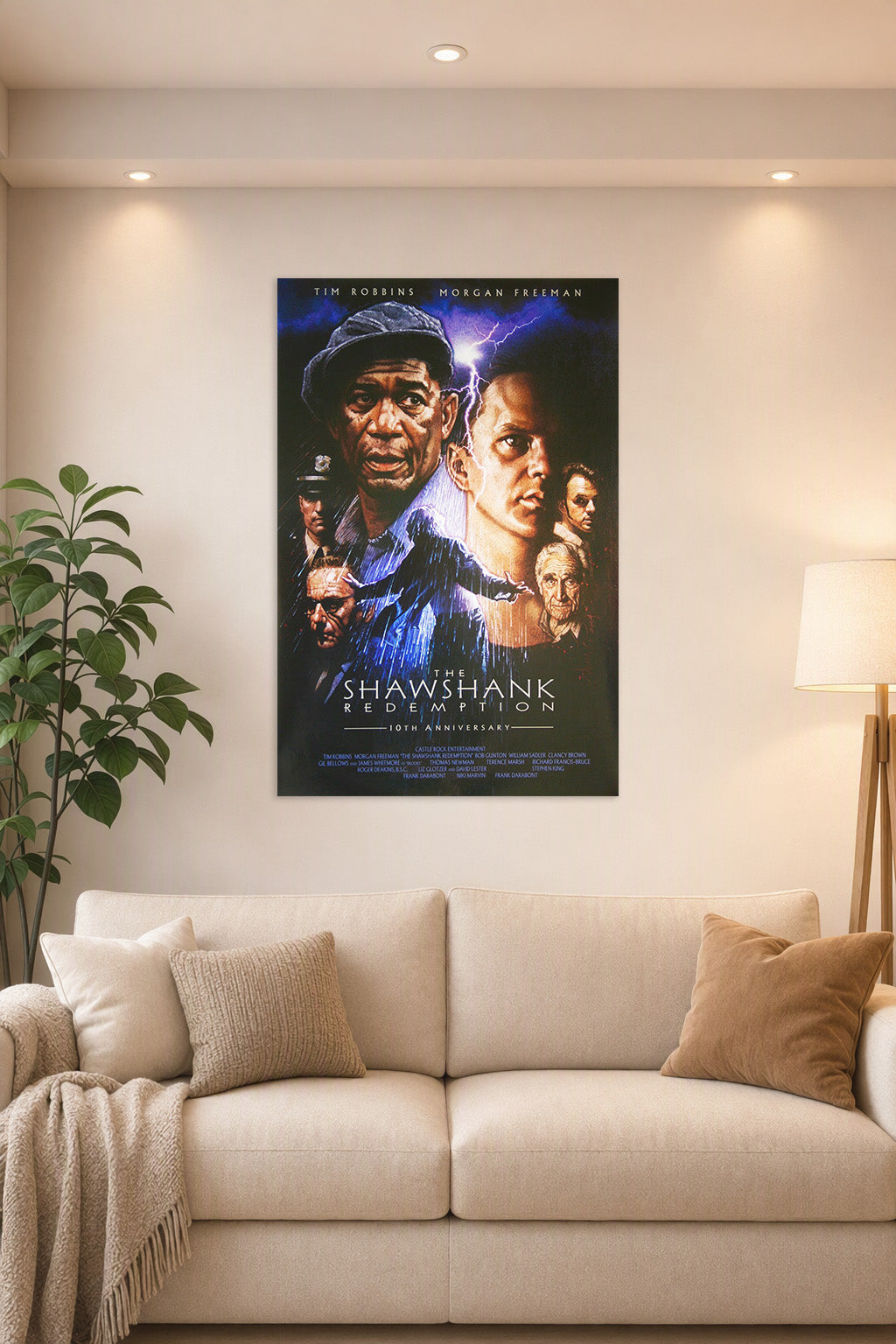 The Shawshank Redemption Movie Poster in a bright living room above a beige sofa.