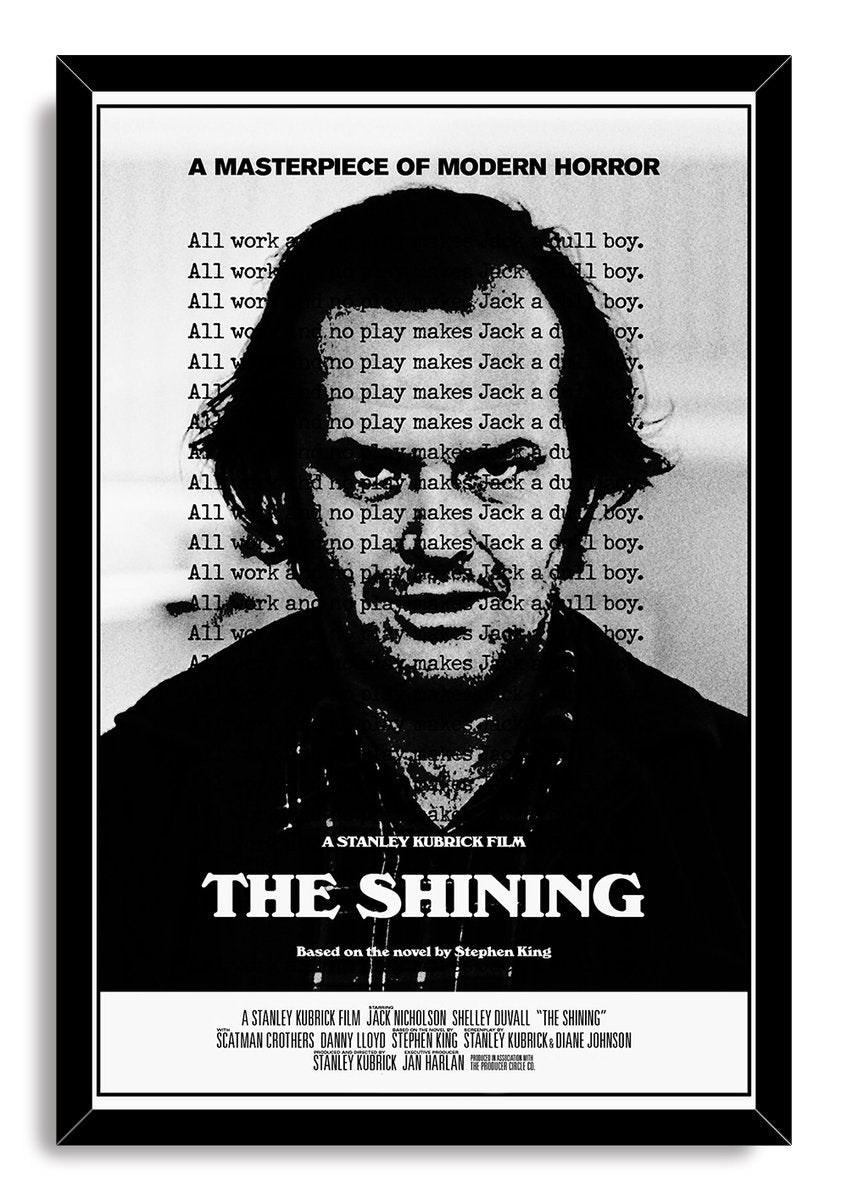 The Shining framed wall art print presents Jack Nicholson in black and white, with repeated typewriter text inside a black frame.