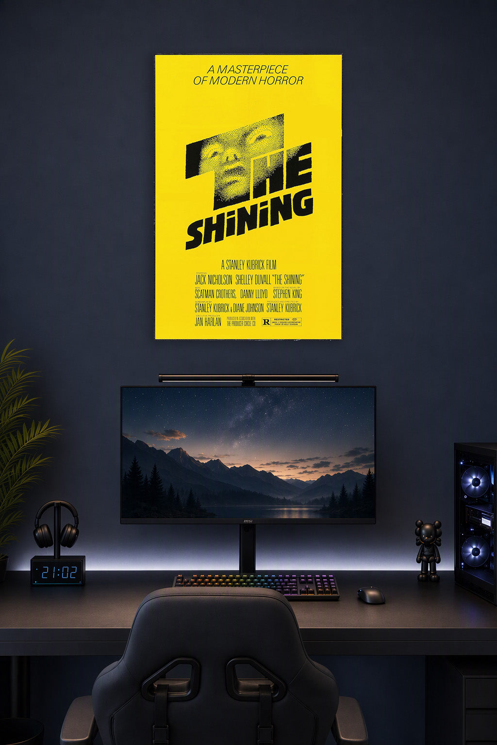 The Shining Movie Poster in a gaming desk setup above a monitor.