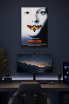 The Silence of the Lambs Movie Poster in a gaming desk setup above a monitor.