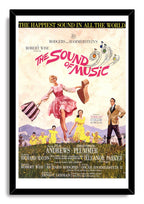 The Sound of Music framed wall art print presents the classic pink title, dancing woman, children, mountains, and black frame.