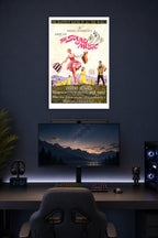 The Sound of Music Movie Poster in a gaming desk setup above a monitor.