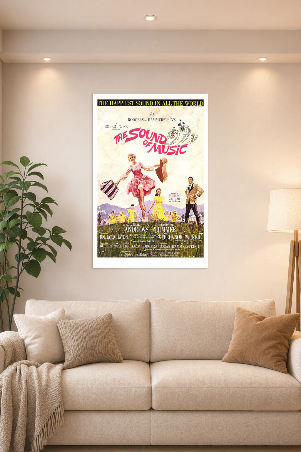 The Sound of Music Movie Poster in a bright living room above a beige sofa.
