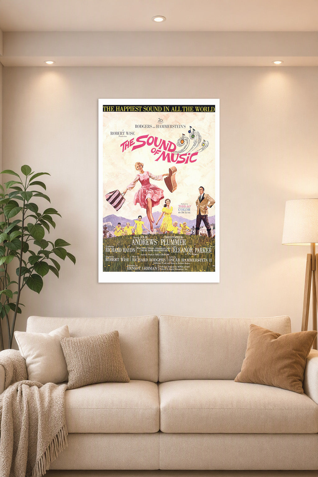 The Sound of Music Movie Poster in a bright living room above a beige sofa.