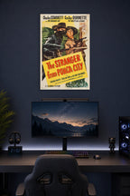 The Stranger from Ponca City Charles Starrett Smiley Burnette Western Movie in a gaming desk setup above a monitor.