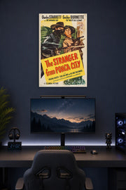 The Stranger from Ponca City Charles Starrett Smiley Burnette Western Movie in a gaming desk setup above a monitor.