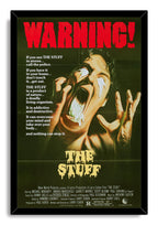 The Stuff framed wall art print features a black frame around the horror poster of a screaming man with white dripping substance.