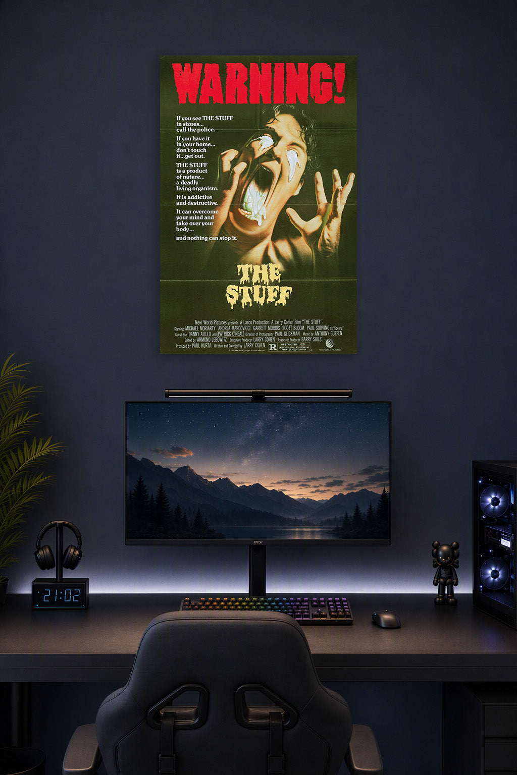 The Stuff Movie in a gaming desk setup above a monitor.