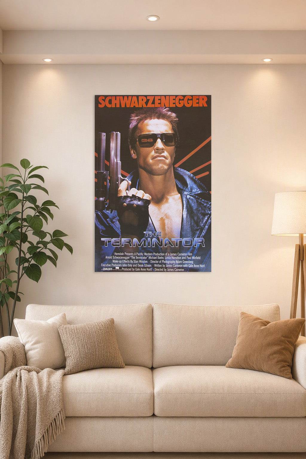 The Terminator Arnold Schwarzenegger in a bright living room above a beige sofa.