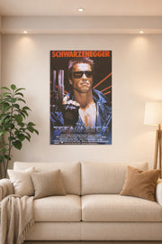 The Terminator Arnold Schwarzenegger in a bright living room above a beige sofa.