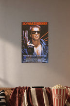 The Terminator Arnold Schwarzenegger in a cozy movie room above a brown sofa with popcorn.