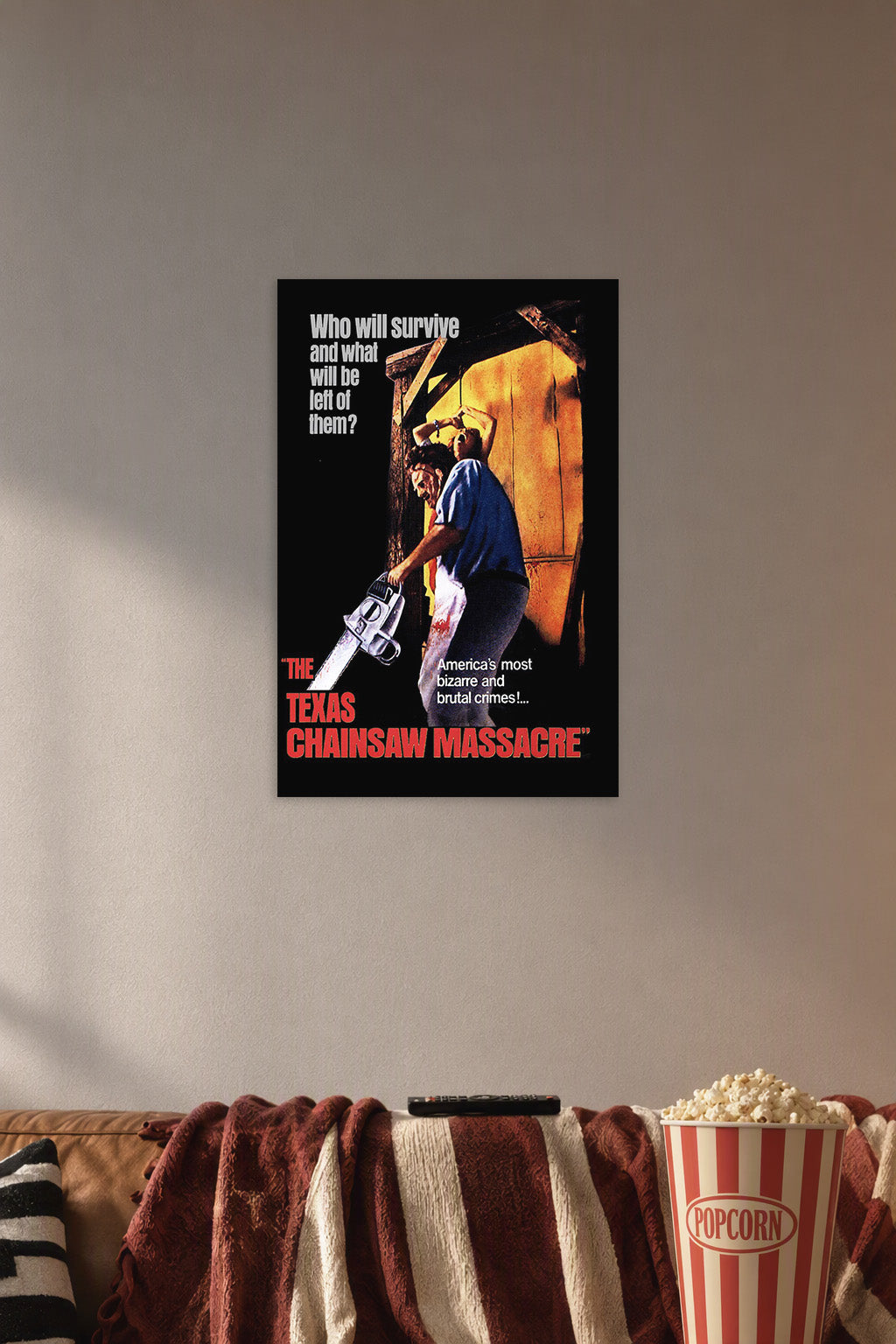The Texas Chain Saw Massacre Horror Film in a cozy movie room above a brown sofa with popcorn.