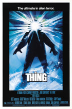 The Thing poster features a dark silhouetted figure with a blinding white face amid radiating blue ice-like beams.