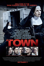 The Town movie poster features armed robbers in nun masks beside an armored truck, cast portraits, and bold red title text.