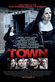 The Town movie poster features armed robbers in nun masks beside an armored truck, cast portraits, and bold red title text.