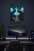 The Vampire Diaries Cast in a gaming desk setup above a monitor.