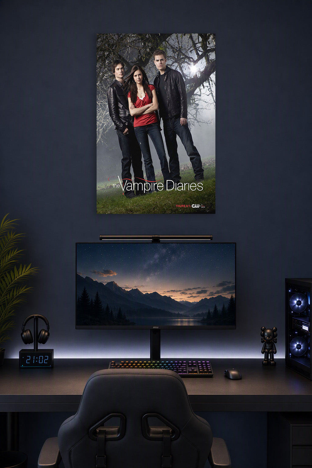 The Vampire Diaries TV Series in a gaming desk setup above a monitor.