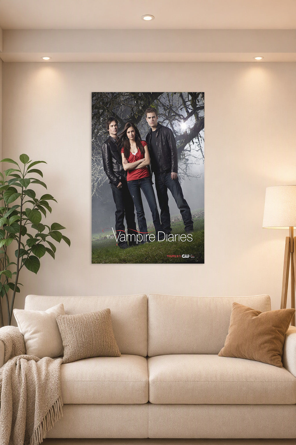 The Vampire Diaries TV Series in a bright living room above a beige sofa.