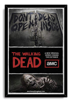 The Walking Dead framed wall art print presents dark warning doors, trapped hands, bold red text, and a decaying walker reaching forward.