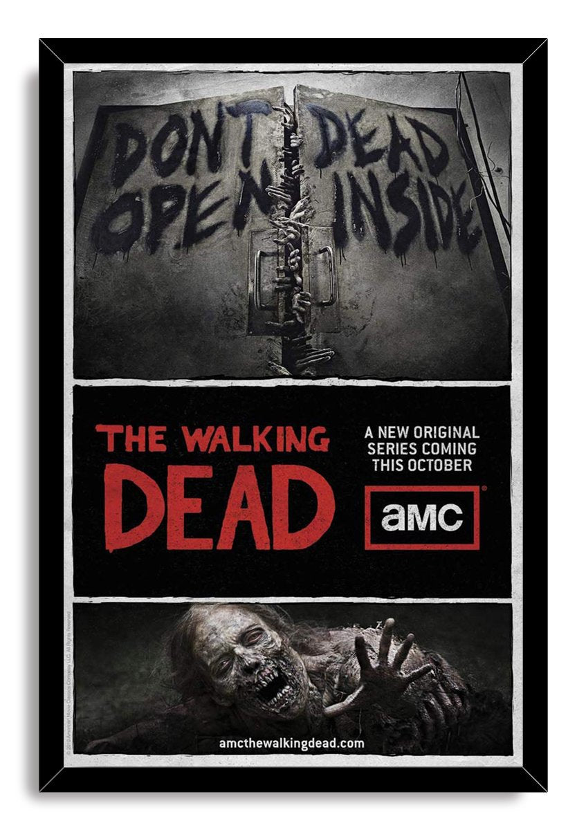 The Walking Dead framed wall art print presents dark warning doors, trapped hands, bold red text, and a decaying walker reaching forward.
