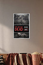 The Walking Dead Don't Open Dead Inside in a cozy movie room above a brown sofa with popcorn.