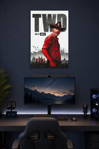 The Walking Dead Rick Grimes in a gaming desk setup above a monitor.