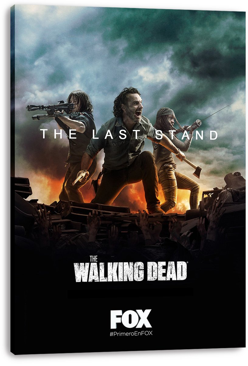 The Walking Dead canvas wall art print viewed from an angle, featuring three survivors with weapons amid flames, wreckage, and raised hands.