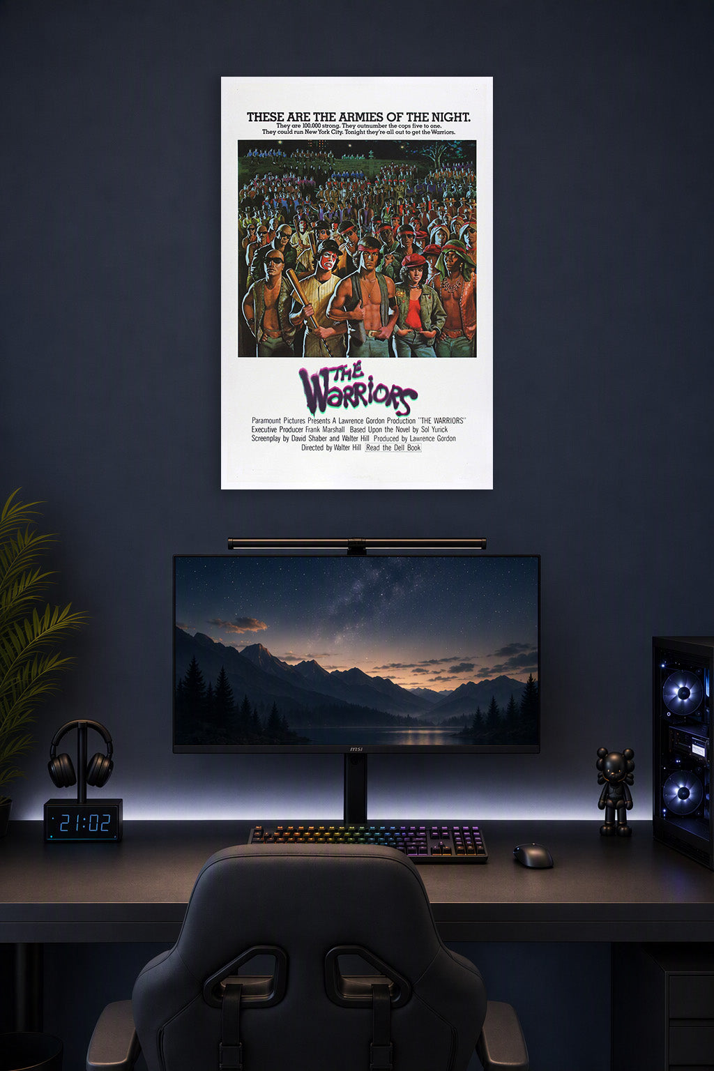 The Warriors in a gaming desk setup above a monitor.