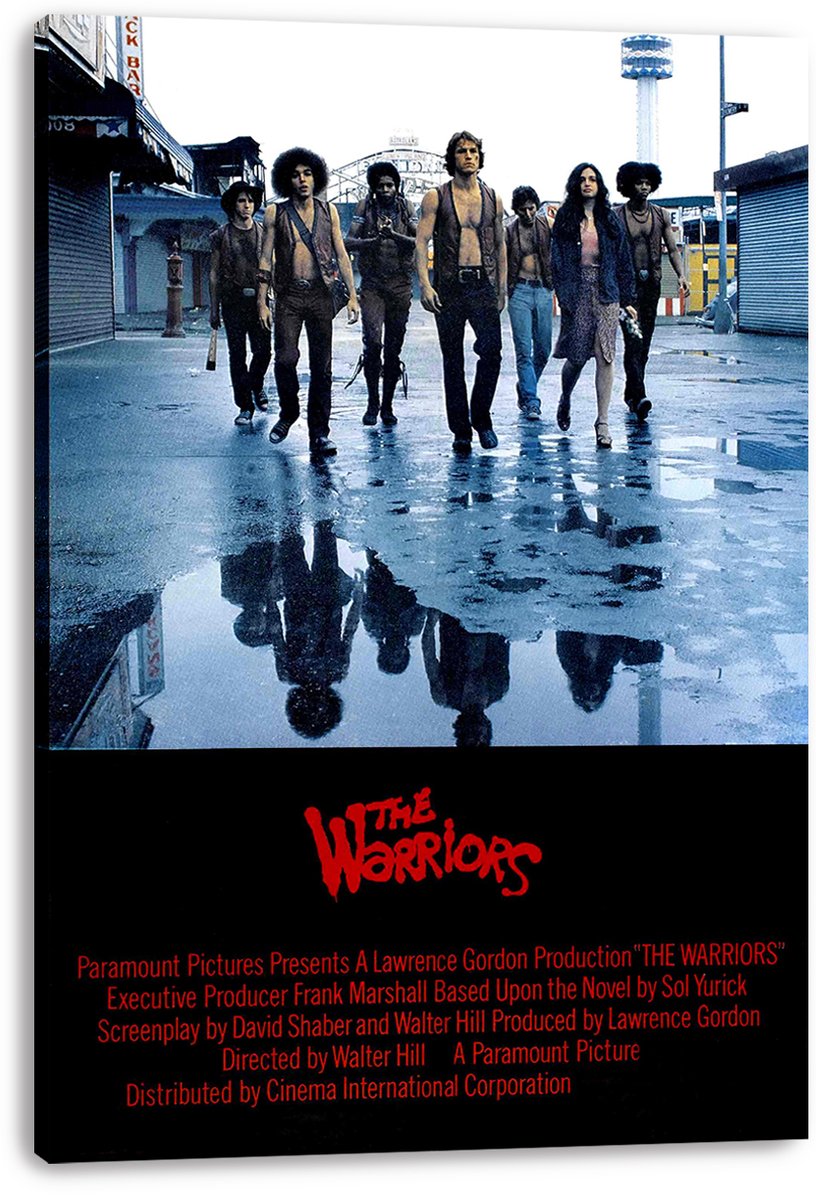 The Warriors wall art canvas presents seven figures striding down a wet blue-gray street, with puddle reflections and bold red title text.