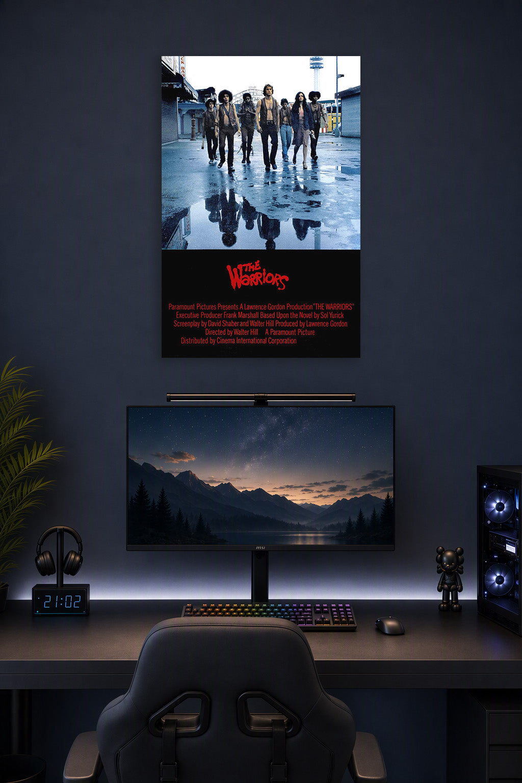 The Warriors Movie in a gaming desk setup above a monitor.