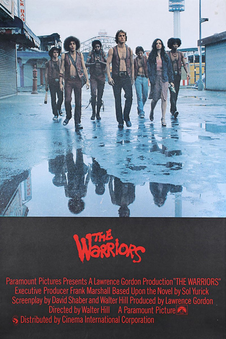 The Warriors poster features seven streetwise figures walking on a rain-soaked city street, reflected in puddles above red credits.