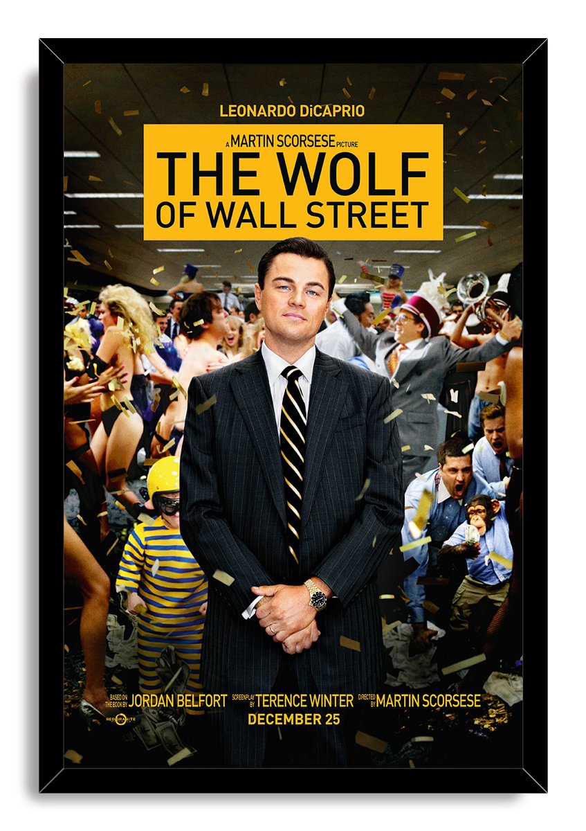 The Wolf of Wall Street framed wall art print features Leonardo DiCaprio in a dark suit, surrounded by a crowded confetti-filled party scene.
