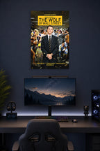 The Wolf of Wall Street Movie in a gaming desk setup above a monitor.