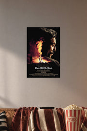 There Will Be Blood in a cozy movie room above a brown sofa with popcorn.