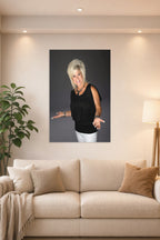 Theresa Caputo in a bright living room above a beige sofa.