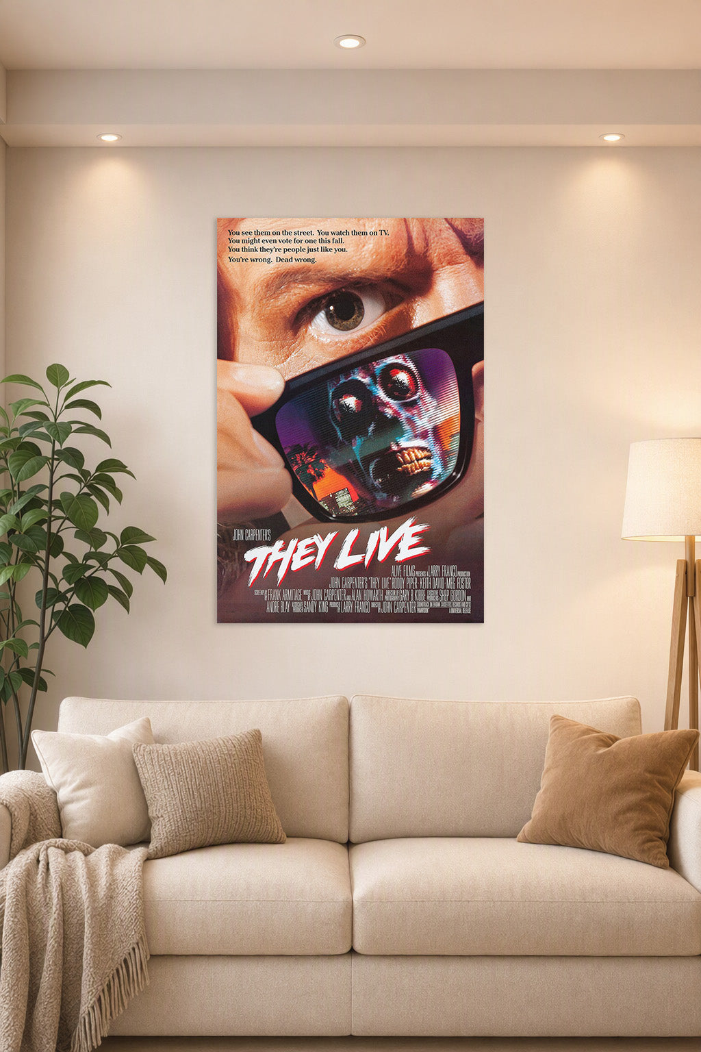 They Live Movie Poster in a bright living room above a beige sofa.
