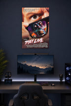 They Live Movie Poster in a gaming desk setup above a monitor.